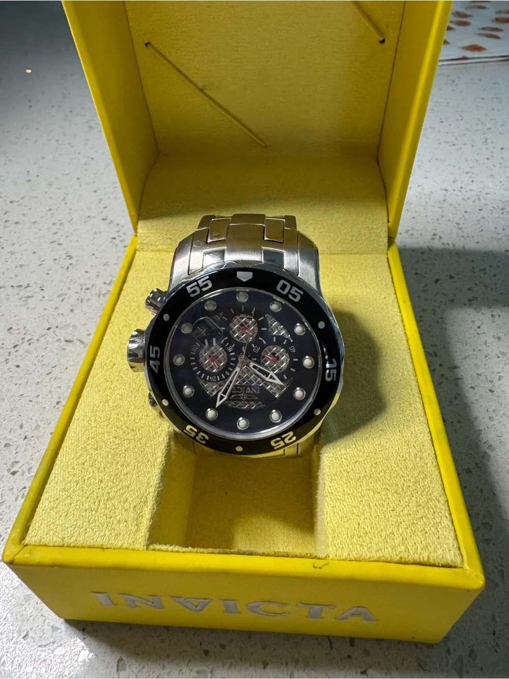 Invicta Silver Men’s Watch with Black Dial and Bezel